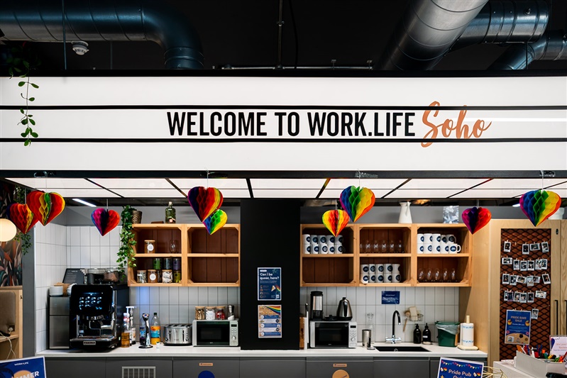 Work.Life Soho banner above kitchen with rainbow hearts