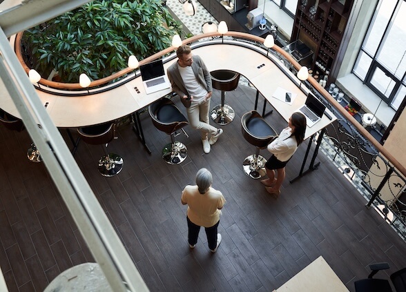 View from above of an office with people walking